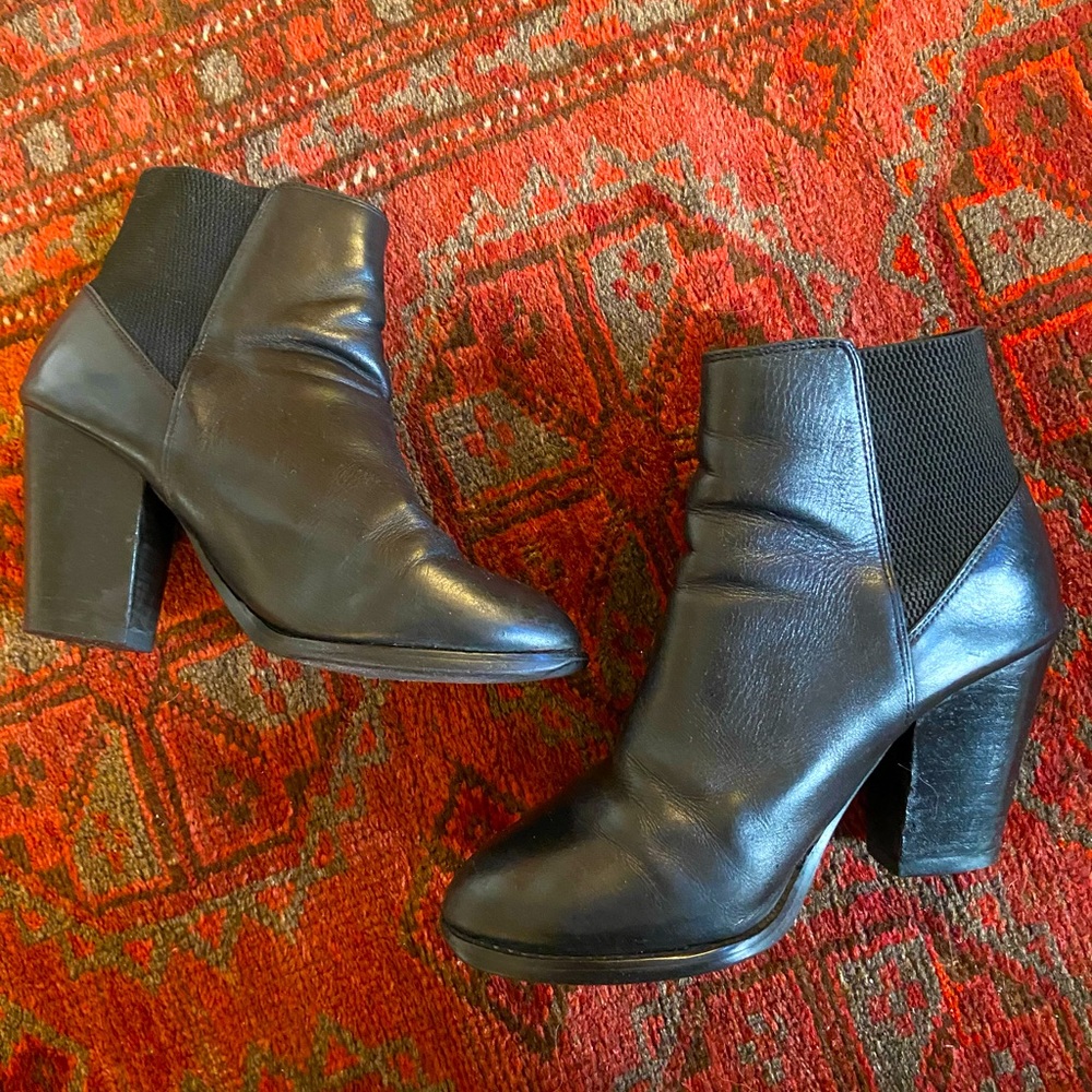 Black leather heeled ankle boots